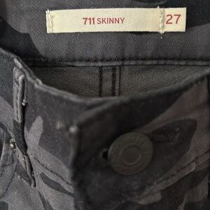 Levi’s black and gray camo skinny jeans